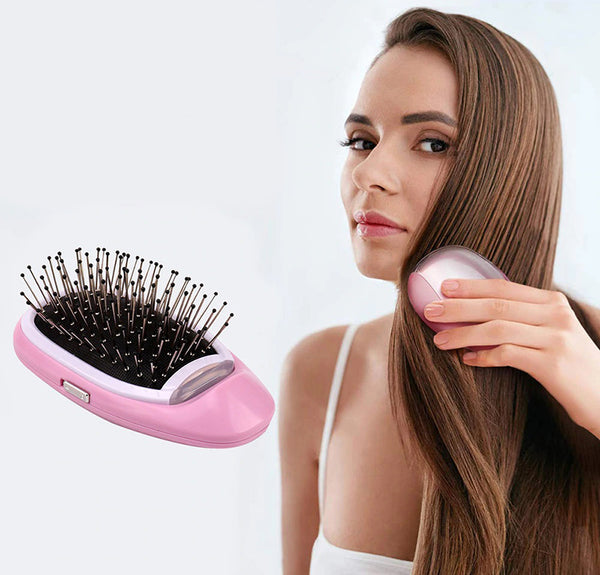 Electro-Ionic Hairbrush ™